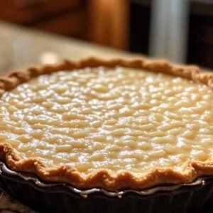 Tarte au Riz de Verviers : La Douceur Belge Qui Réconforte à Chaque Bouchée 7 Tarte au riz de Verviers traditionnelle fraîchement sortie du four