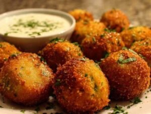 Ingrédients pour croquettes aux courgettes disposés sur plan de travail